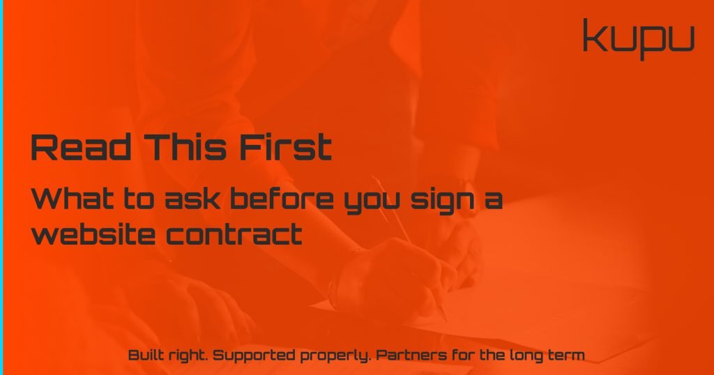 Business owner reviewing website contract questions before signing